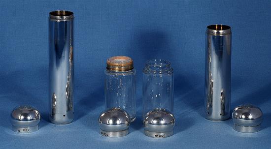 Four late Victorian dressing table cylindrical jars, tallest 176mm. Weight of silver 10.4oz/325 grams.